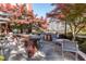 Community outdoor kitchen and grill area with plenty of seating and lush surroundings at 618 N Boylan Ave # 622, Raleigh, NC 27603