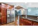 Stylish kitchen with stainless steel appliances, granite counters, and adjacent dining area at 618 N Boylan Ave # 622, Raleigh, NC 27603