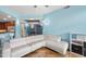 Bright living room features light blue walls and large white sectional sofa at 618 N Boylan Ave # 622, Raleigh, NC 27603