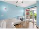 Spacious living room with hardwood floors and access to outdoor balcony at 618 N Boylan Ave # 622, Raleigh, NC 27603