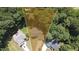 Aerial view of home on .63 acre lot featuring mature trees and landscaping at 624 Moultonboro Ave, Wake Forest, NC 27587