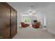 Spacious bonus room features a built-in cabinet, comfortable seating, and ample natural light at 624 Moultonboro Ave, Wake Forest, NC 27587