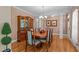 Formal dining area with hardwood floors, an elegant chandelier, and ample space at 624 Moultonboro Ave, Wake Forest, NC 27587
