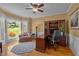 Well-lit office space featuring hardwood floors and a traditional desk setup at 624 Moultonboro Ave, Wake Forest, NC 27587