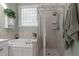Close-up of a bathtub and shower in a bathroom with natural light at 624 Moultonboro Ave, Wake Forest, NC 27587