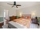 Comfortable bedroom with a ceiling fan, stylish furniture, and ample natural light at 6324 Daybreak Dr, Wake Forest, NC 27587