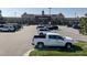 Exterior of Wegmans with a view of the parking lot with parked cars at 6324 Daybreak Dr, Wake Forest, NC 27587