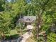Aerial view of single-Gathering home surrounded by lush landscaping at 6509 Mountain Brook Ln, Raleigh, NC 27615
