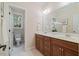 Bathroom with a double vanity and classic wood cabinets at 6509 Mountain Brook Ln, Raleigh, NC 27615