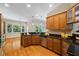 A fully equipped kitchen featuring stainless steel appliances, granite countertops, and ample cabinet space at 6509 Mountain Brook Ln, Raleigh, NC 27615