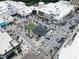 Aerial view of shopping center with restaurants and many parking spaces at 6509 Mountain Brook Ln, Raleigh, NC 27615