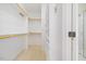 Bright walk-in closet with ample shelving and hanging space for optimal organization at 6509 Mountain Brook Ln, Raleigh, NC 27615