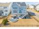 Aerial view of a backyard with a deck, stairs, patio, hot tub, and gazebo at 6633 Penfield St, Wake Forest, NC 27587