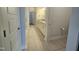 Bright bathroom with a double vanity, granite countertop, and tiled floor at 6633 Penfield St, Wake Forest, NC 27587