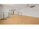 Spacious bonus room featuring ballet barres, hard wood floors, and a large mirror at 6633 Penfield St, Wake Forest, NC 27587