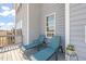 Inviting deck with comfortable chaise lounge seating and pleasant natural lighting at 6633 Penfield St, Wake Forest, NC 27587