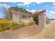 Community entrance to Bridgeport surrounded by lush landscaping and stone at 6633 Penfield St, Wake Forest, NC 27587