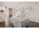 Open-concept kitchen with granite island and stylish pendant lighting at 6633 Penfield St, Wake Forest, NC 27587