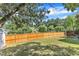 Fenced-in backyard with a lush lawn providing ample space for outdoor activities at 7 Bonham Ct, Durham, NC 27703