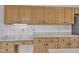 Kitchen cabinets with white countertops and black hardware offer style and storage at 7 Bonham Ct, Durham, NC 27703