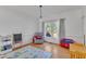 Playroom with natural light, hardwood floors, and ample space for toys and activities, creating an ideal play space at 7 Bonham Ct, Durham, NC 27703
