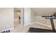 Exercise room with fitness equipment and an open doorway at 712 Evanvale Ct, Cary, NC 27518