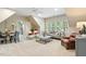 Spacious living room with seating area and ceiling fan at 712 Evanvale Ct, Cary, NC 27518