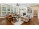 Inviting living room boasts a fireplace, built-in shelving, and large windows offering natural light at 712 Evanvale Ct, Cary, NC 27518