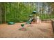 Community playground with slides and various play structures, perfect for Gathering fun at 712 Evanvale Ct, Cary, NC 27518
