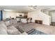 Open living space that connects the living room to the modern kitchen and dining area, perfect for Gathering and social gatherings at 729 Little Patch St, Zebulon, NC 27597