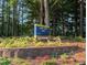 Community sign for Lake Lynn Park amongst lush greenery at 7401 Ray Rd, Raleigh, NC 27613
