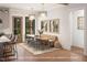 Cozy dining nook with an adjacent open door leading to a patio space, flooded with light at 7401 Ray Rd, Raleigh, NC 27613