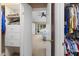 Organized walk-in closet with shelving, rods, and ample storage space at 7508 Venture Ct, Raleigh, NC 27615