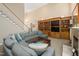 Comfortable living room with built-in shelving and a staircase at 7508 Venture Ct, Raleigh, NC 27615