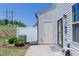 Backyard patio with outdoor seating area and a well-maintained lawn at 79 Hawkstone Dr, Clayton, NC 27527