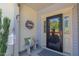 Inviting front porch with charming decor, a stone bench, and a well-maintained entrance at 79 Hawkstone Dr, Clayton, NC 27527