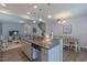 Modern kitchen with granite countertops, stainless steel appliances, and an open design at 79 Hawkstone Dr, Clayton, NC 27527