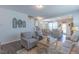 Comfortable living room adjacent to the kitchen, ideal for Gathering gatherings and entertaining at 79 Hawkstone Dr, Clayton, NC 27527