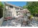 A house with a spacious backyard patio perfect for outdoor dining and relaxing at 800 Oxbow Crossing Rd, Chapel Hill, NC 27516