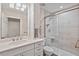 Modern bathroom featuring a sink vanity, shower with a glass door, and recessed lighting at 800 Oxbow Crossing Rd, Chapel Hill, NC 27516