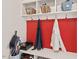 Convenient mudroom with hooks, shelves, and storage, offering organization and style at 800 Oxbow Crossing Rd, Chapel Hill, NC 27516