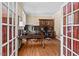 Spacious office with hardwood floors, built-in cabinetry, and natural light at 800 Oxbow Crossing Rd, Chapel Hill, NC 27516