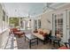Inviting screened porch with neutral color palette, comfortable seating, and outdoor ambiance at 800 Oxbow Crossing Rd, Chapel Hill, NC 27516