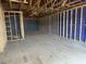 Spacious unfinished basement with exposed framing and utility connections at 803 Fireship Rd, Fuquay Varina, NC 27526