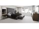 Spacious bedroom with a plush bed, bench, and modern decor offering a relaxing and sophisticated ambiance at 803 Fireship Rd, Fuquay Varina, NC 27526