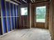 Unfinished bedroom showing the framing and construction stage, revealing the structure of the space at 803 Fireship Rd, Fuquay Varina, NC 27526