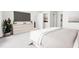 Serene main bedroom with sleek furniture, a plush bed, and ample natural light at 803 Fireship Rd, Fuquay Varina, NC 27526