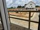 A view from the house looking out onto the construction site and neighborhood at 805 Fireship Rd, Fuquay Varina, NC 27526