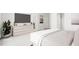 Tranquil main bedroom features a large dresser, soft lighting, and calm ambiance to relax and unwind at 805 Fireship Rd, Fuquay Varina, NC 27526