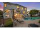 Backyard featuring a swimming pool, lounge chairs, and a second-story deck with an umbrella table at 817 Highwater Pl, Fuquay Varina, NC 27526